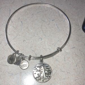 Alex & Ani silver bracelet with Lighthouse charm